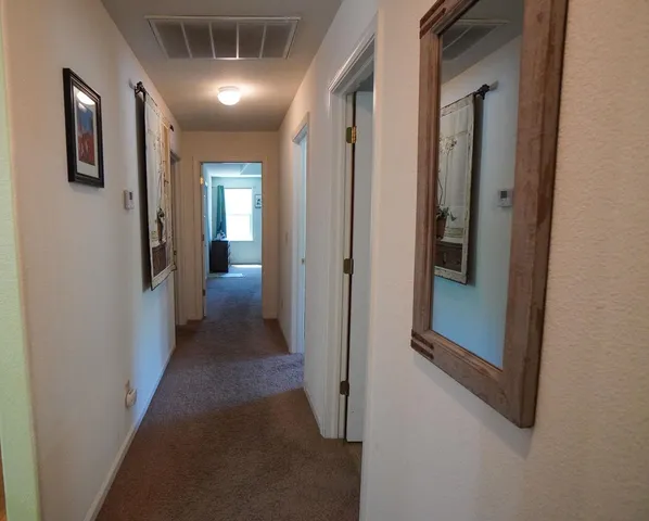 a bedroom with a bed furniture and window