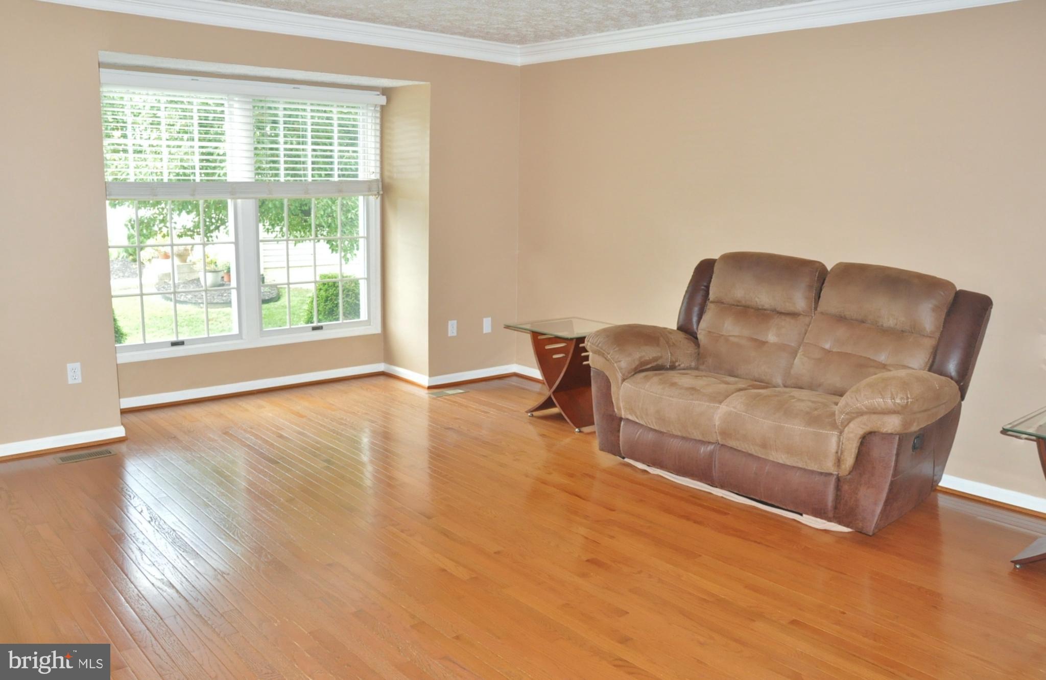 21 Margery Court Nottingham, MD 21236 - Photo 18 of 67 a living room with furniture and a large window