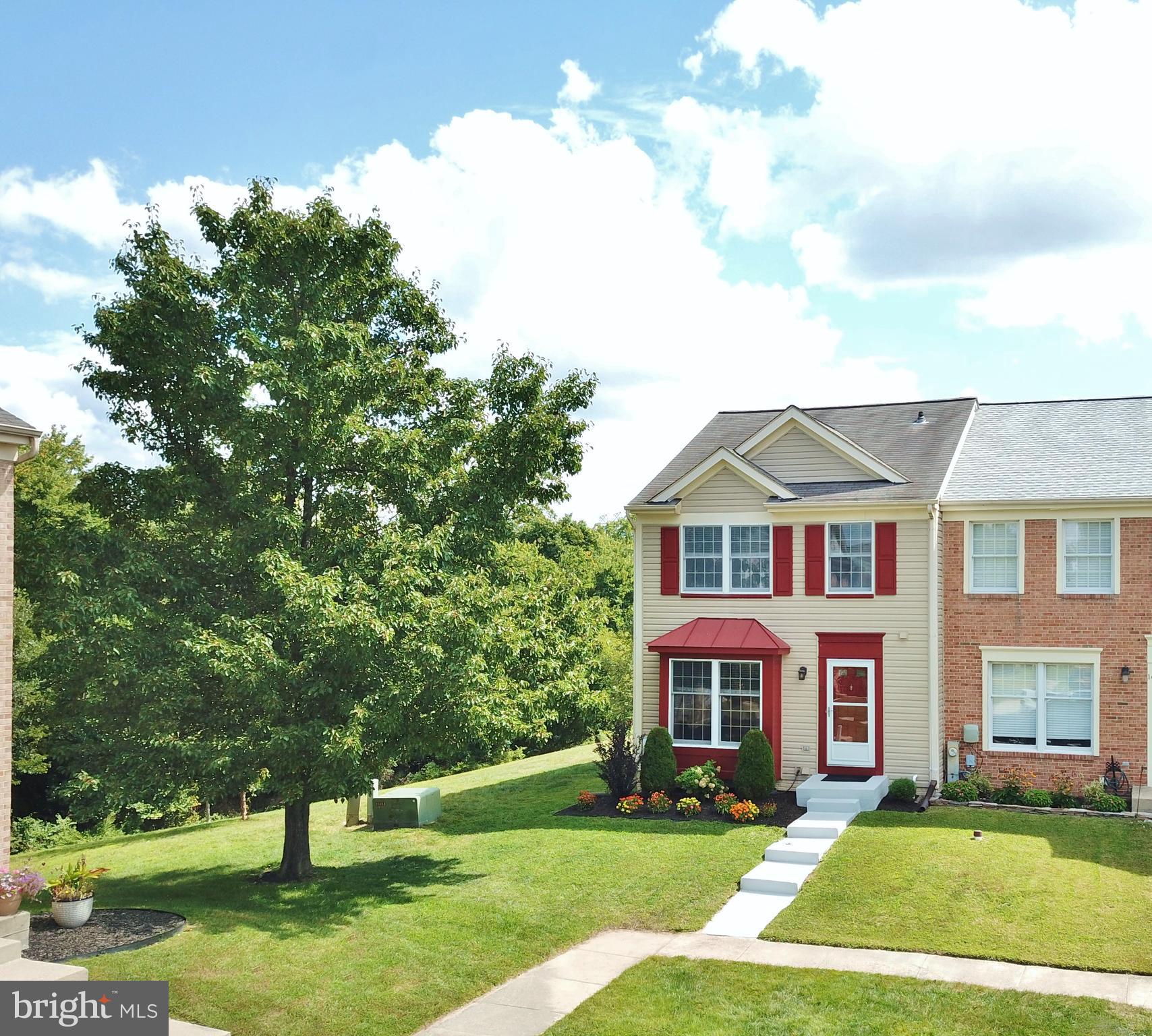 21 Margery Court Nottingham, MD 21236 - Photo 2 of 67 a front view of a house with a yard
