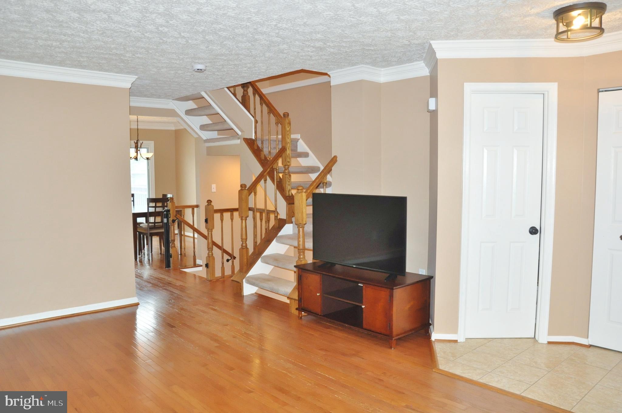 21 Margery Court Nottingham, MD 21236 - Photo 21 of 67 a living room with furniture and a flat screen tv