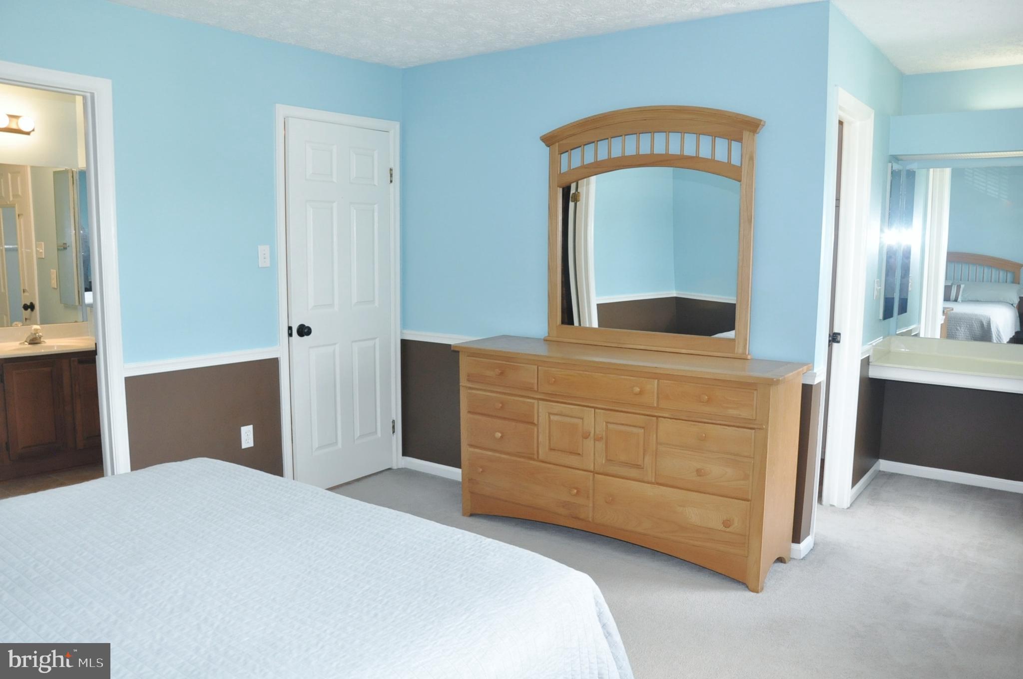 21 Margery Court Nottingham, MD 21236 - Photo 33 of 67 a bedroom with a bed and a dresser