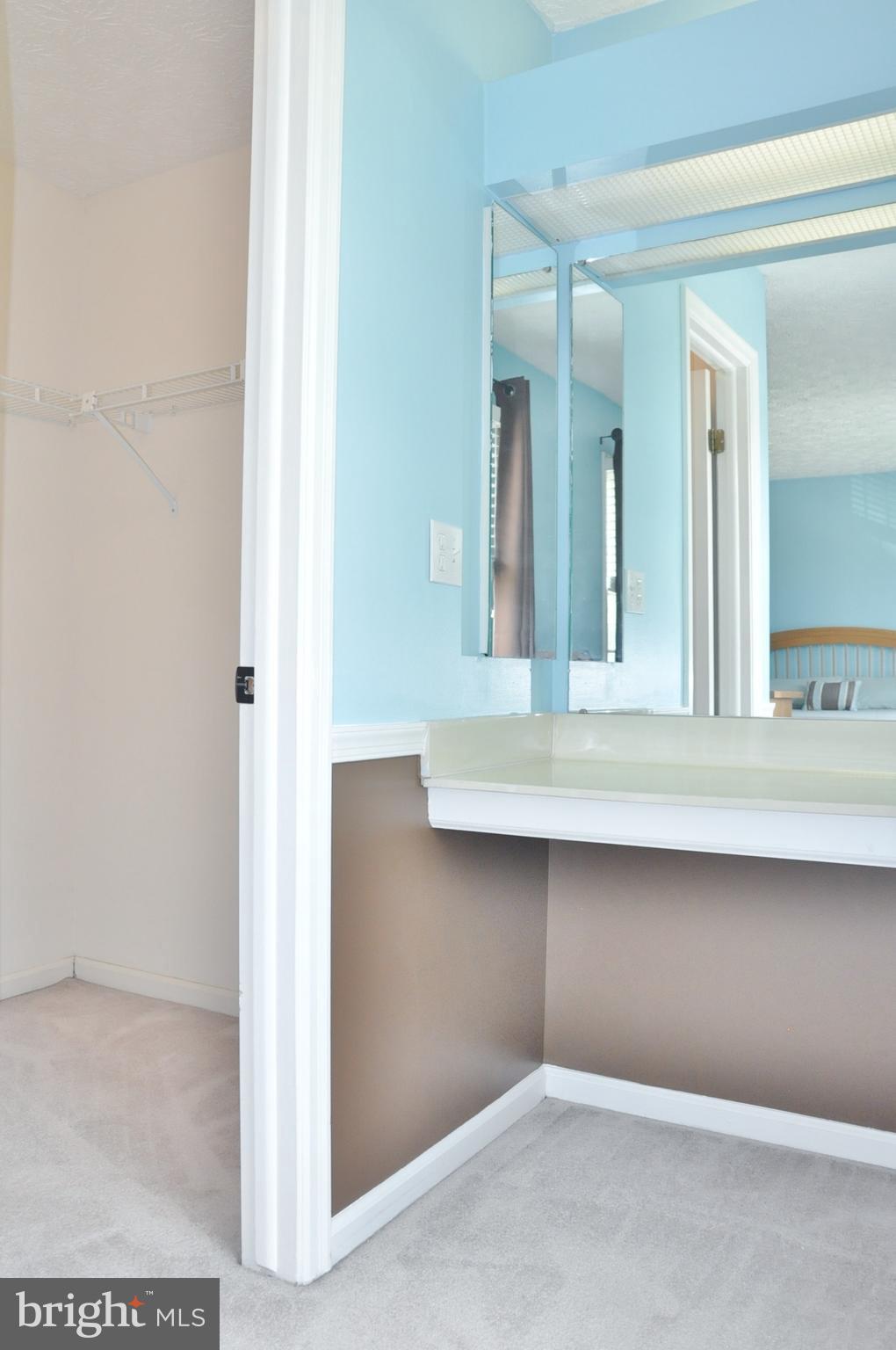 21 Margery Court Nottingham, MD 21236 - Photo 35 of 67 a bathroom with a sink and a mirror