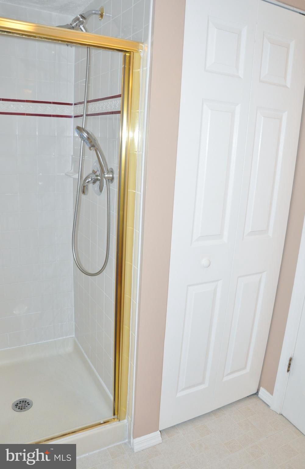 21 Margery Court Nottingham, MD 21236 - Photo 50 of 67 a bathroom with a glass shower door