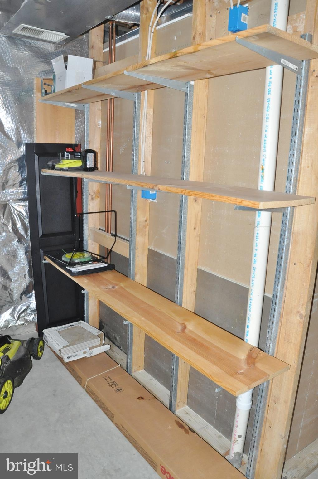 21 Margery Court Nottingham, MD 21236 - Photo 53 of 67 a kitchen with stainless steel appliances kitchen island granite countertop a refrigerator and a stove