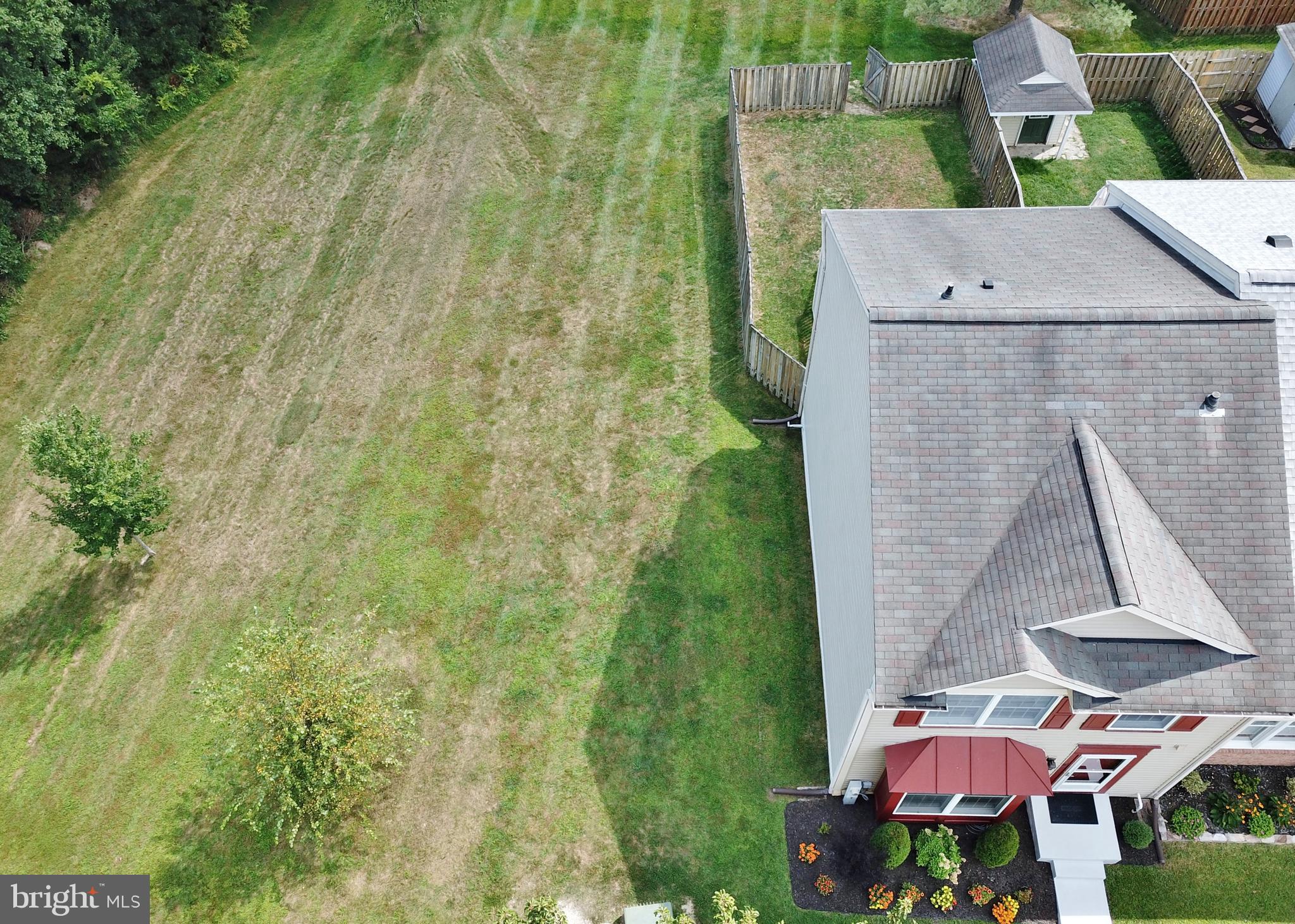 21 Margery Court Nottingham, MD 21236 - Photo 64 of 67 an aerial view of residential houses with outdoor space and trees