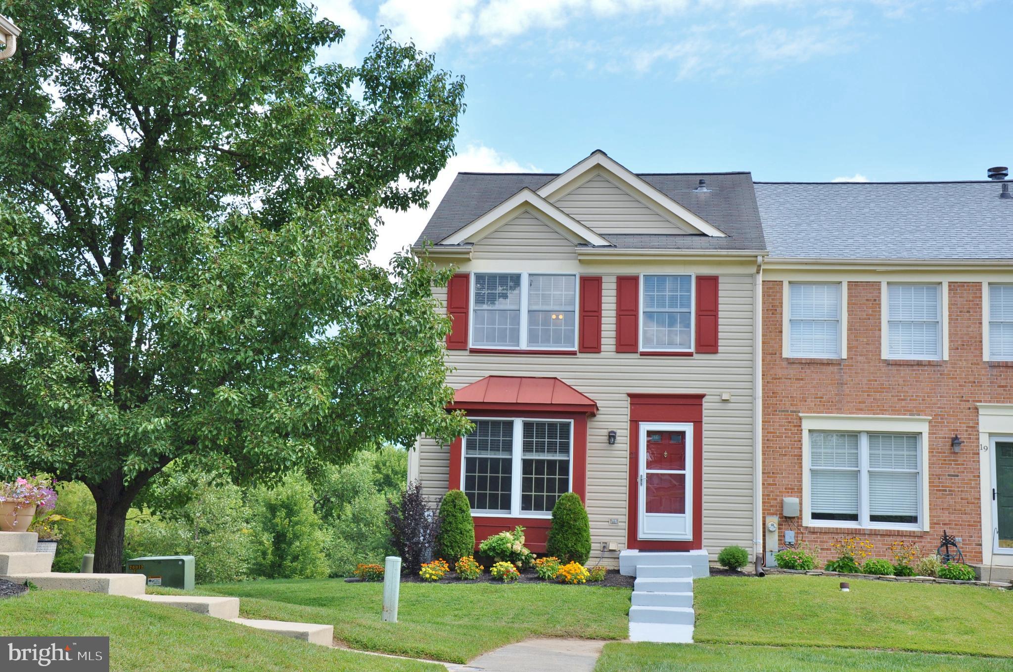 21 Margery Court Nottingham, MD 21236 - Photo 7 of 67 front view of a house with a yard