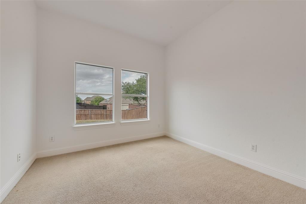 413 Kearsarge Street DeSoto, TX 75115 - Photo 16 of 33 an empty room with a window