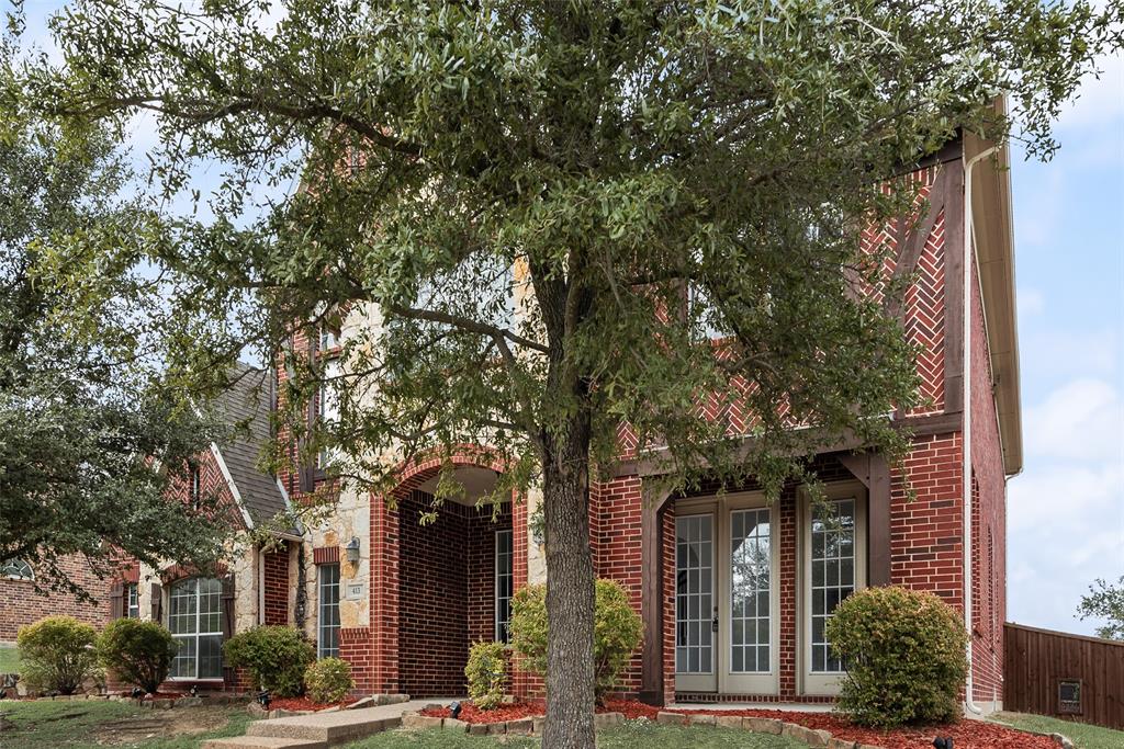 413 Kearsarge Street DeSoto, TX 75115 - Photo 2 of 33 front view of a building with a tree
