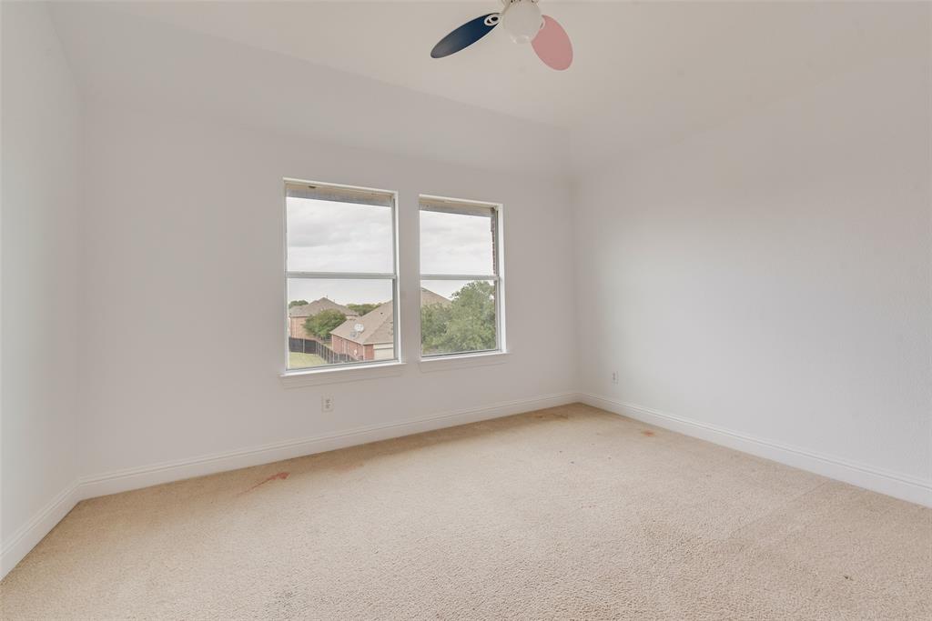 413 Kearsarge Street DeSoto, TX 75115 - Photo 23 of 33 an empty room with windows