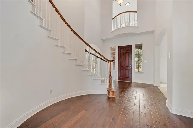 a view of entryway with wooden floor
