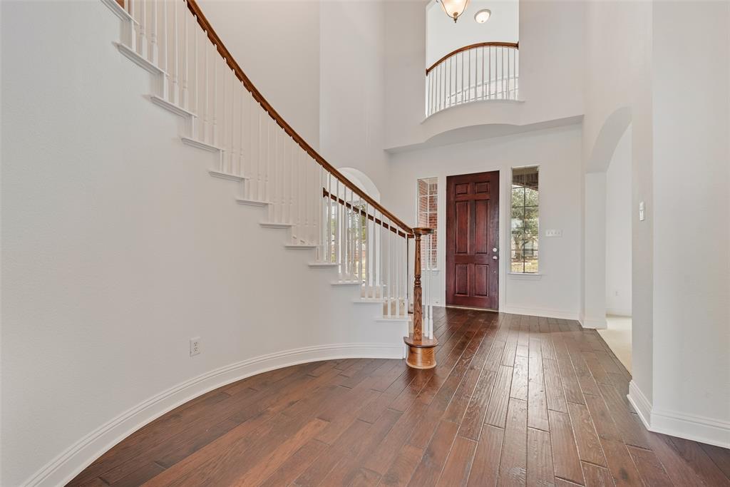 413 Kearsarge Street DeSoto, TX 75115 - Photo 5 of 33 a view of entryway with wooden floor