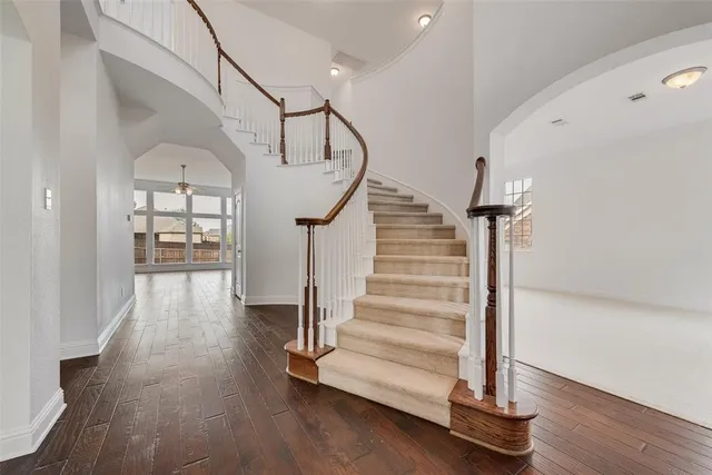 a view of entryway with wooden floor