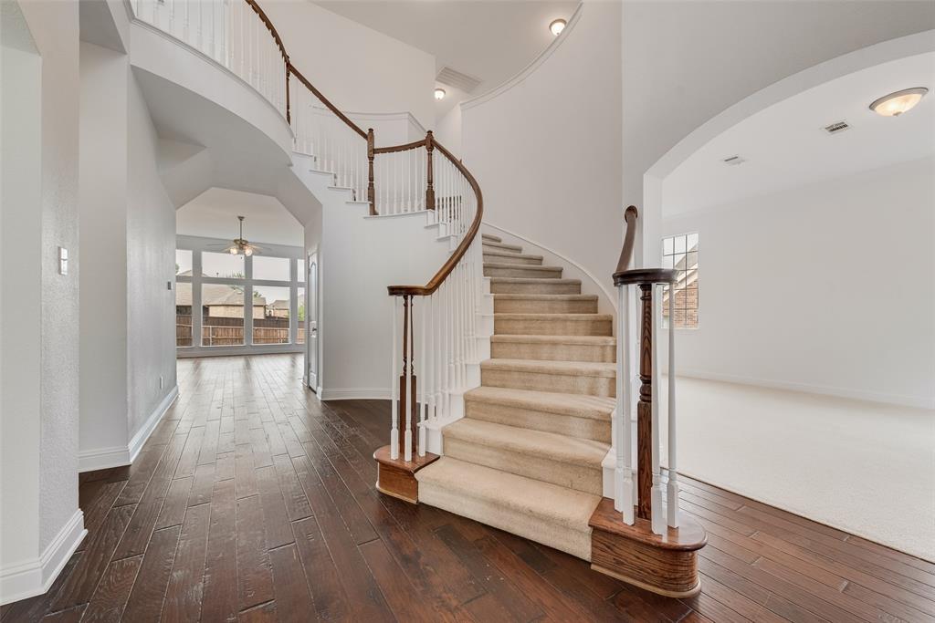 413 Kearsarge Street DeSoto, TX 75115 - Photo 6 of 33 a view of entryway with wooden floor