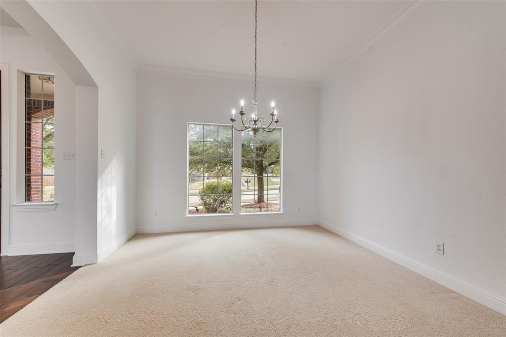 413 Kearsarge Street DeSoto, TX 75115 - Photo 7 of 33 a view of a room with window and chandelier