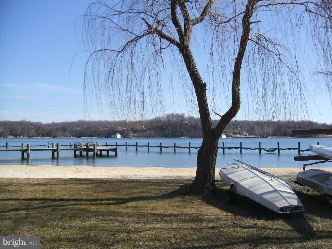 100 A Edgehill Road Annapolis, MD 21405 - Photo 11 of 30 a view of swimming pool with outdoor seating and a yard