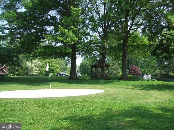 100 A Edgehill Road Annapolis, MD 21405 - Photo 25 of 30 a view of a park with trees in the background