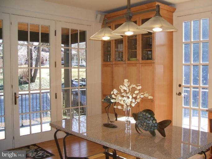 100 A Edgehill Road Annapolis, MD 21405 - Photo 7 of 30 a dining room with furniture and chandelier fan