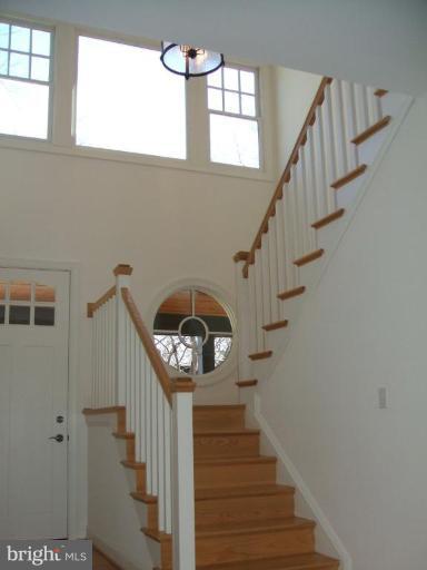 100 A Edgehill Road Annapolis, MD 21405 - Photo 8 of 30 a view of entryway and hall with wooden floor
