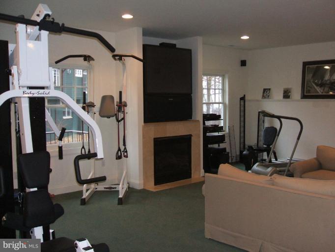 100 A Edgehill Road Annapolis, MD 21405 - Photo 9 of 30 a view of a room with gym equipment