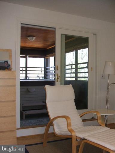100 A Edgehill Road Annapolis, MD 21405 - Photo 10 of 30 a room with a table and windows