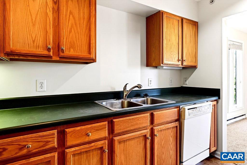 2084 Stone Ridge Wintergreen, VA 22967 - Photo 12 of 41 a kitchen with stainless steel appliances granite countertop a sink and cabinets