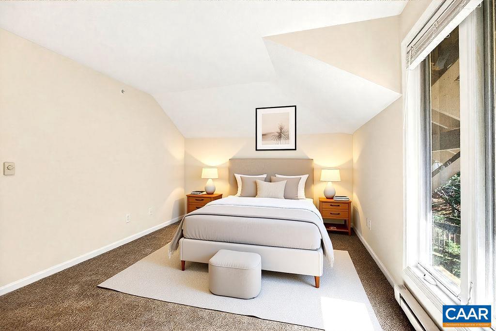 2084 Stone Ridge Wintergreen, VA 22967 - Photo 26 of 41 a bedroom with a bed and wooden floor