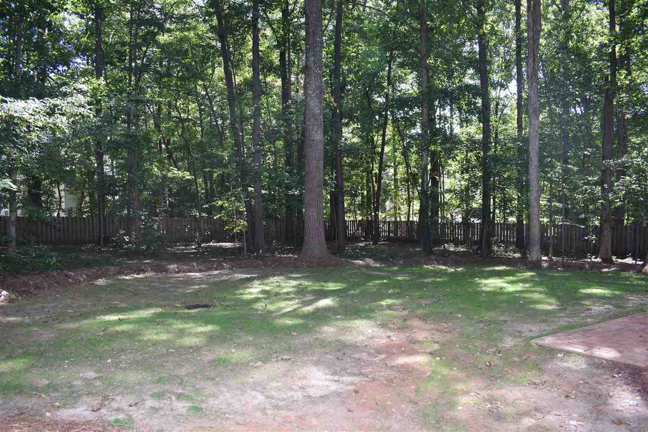 1605 Dressage Court Raleigh, NC 27613 - Photo 18 of 21 Wonderful almost 1 acre lot with fenced backyard. Back Yard