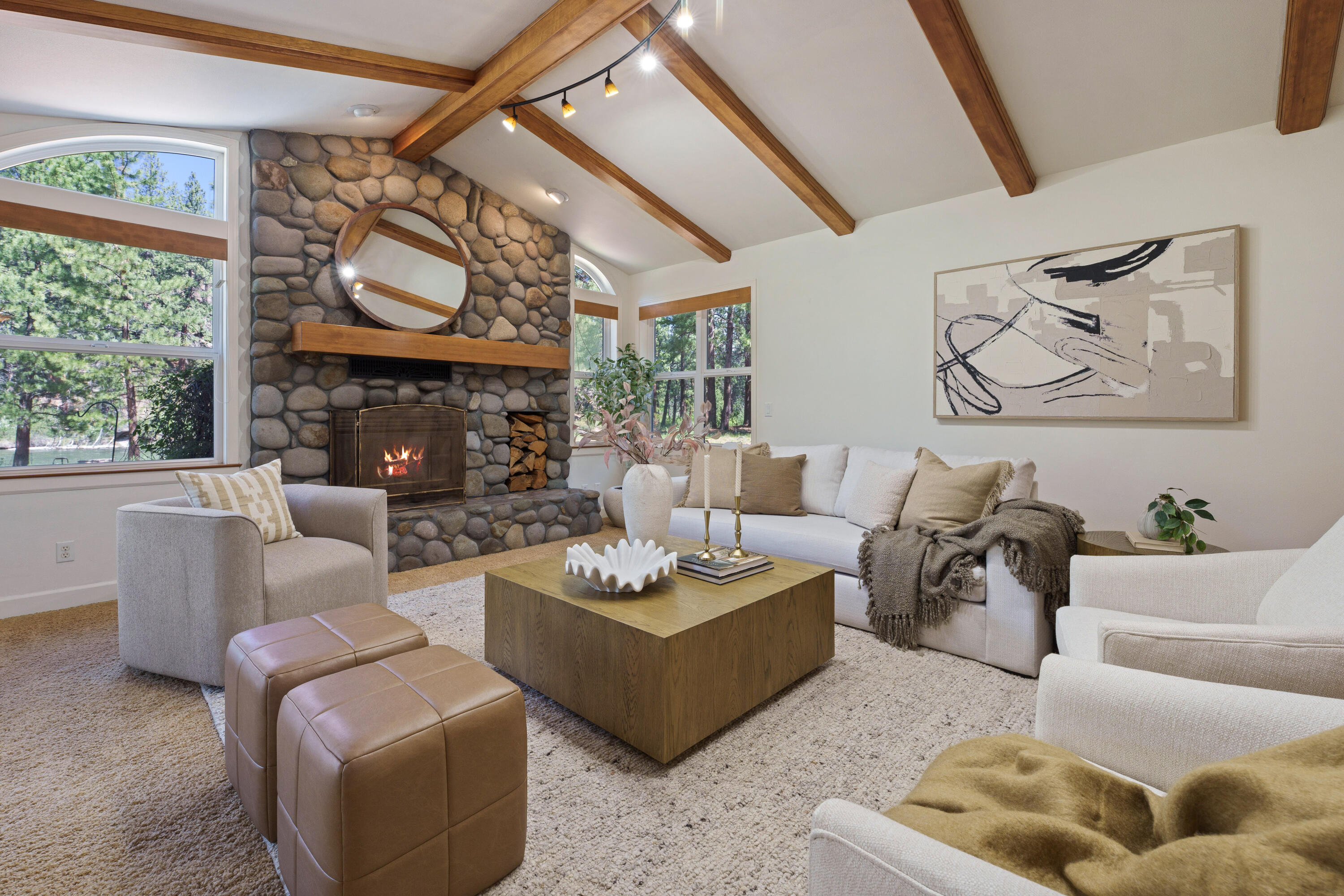 18880 Baker Road Bend, OR 97702 - Photo 31 of 70 a living room with furniture a fireplace and a window