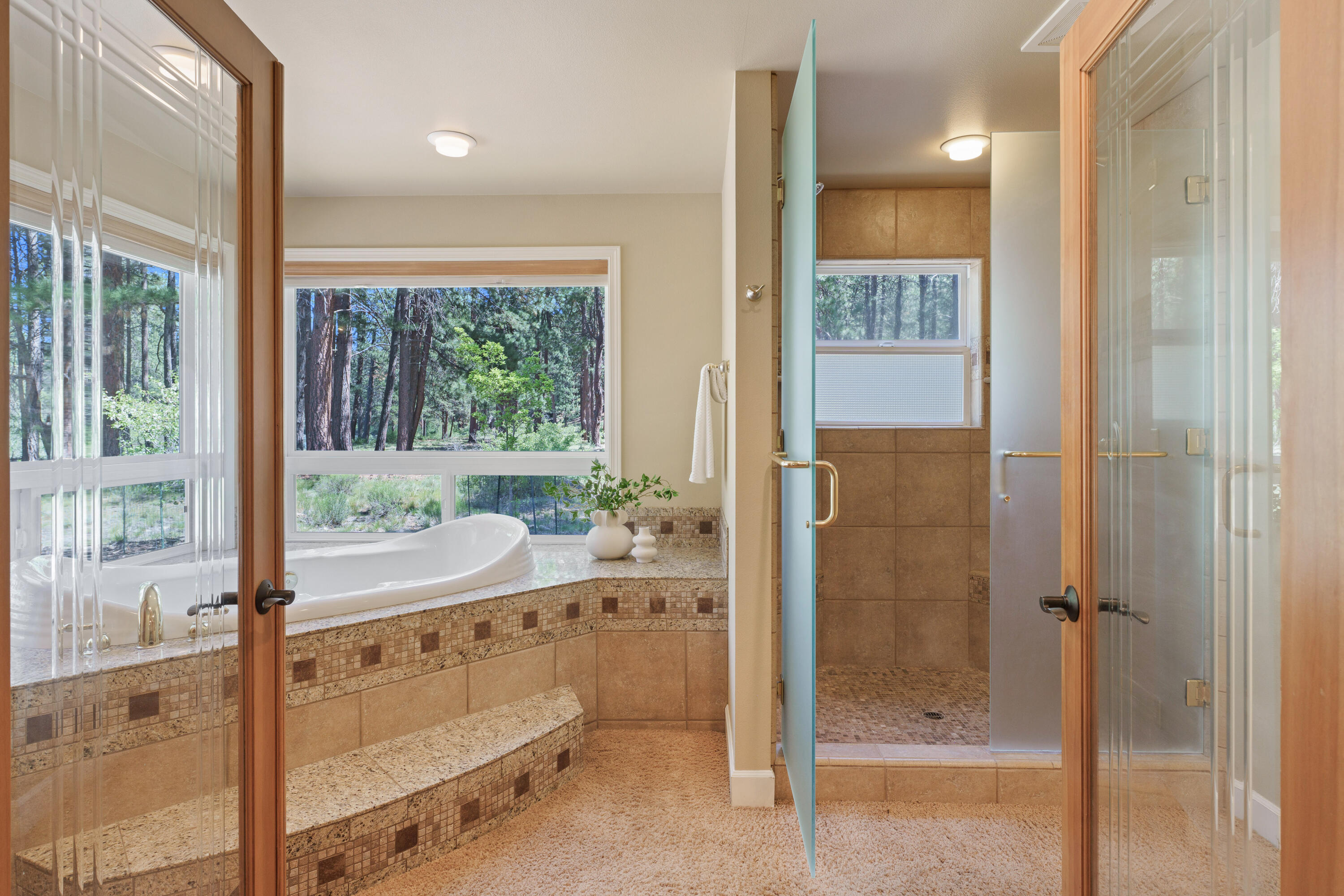 18880 Baker Road Bend, OR 97702 - Photo 40 of 70 a bathroom with a shower and a sink