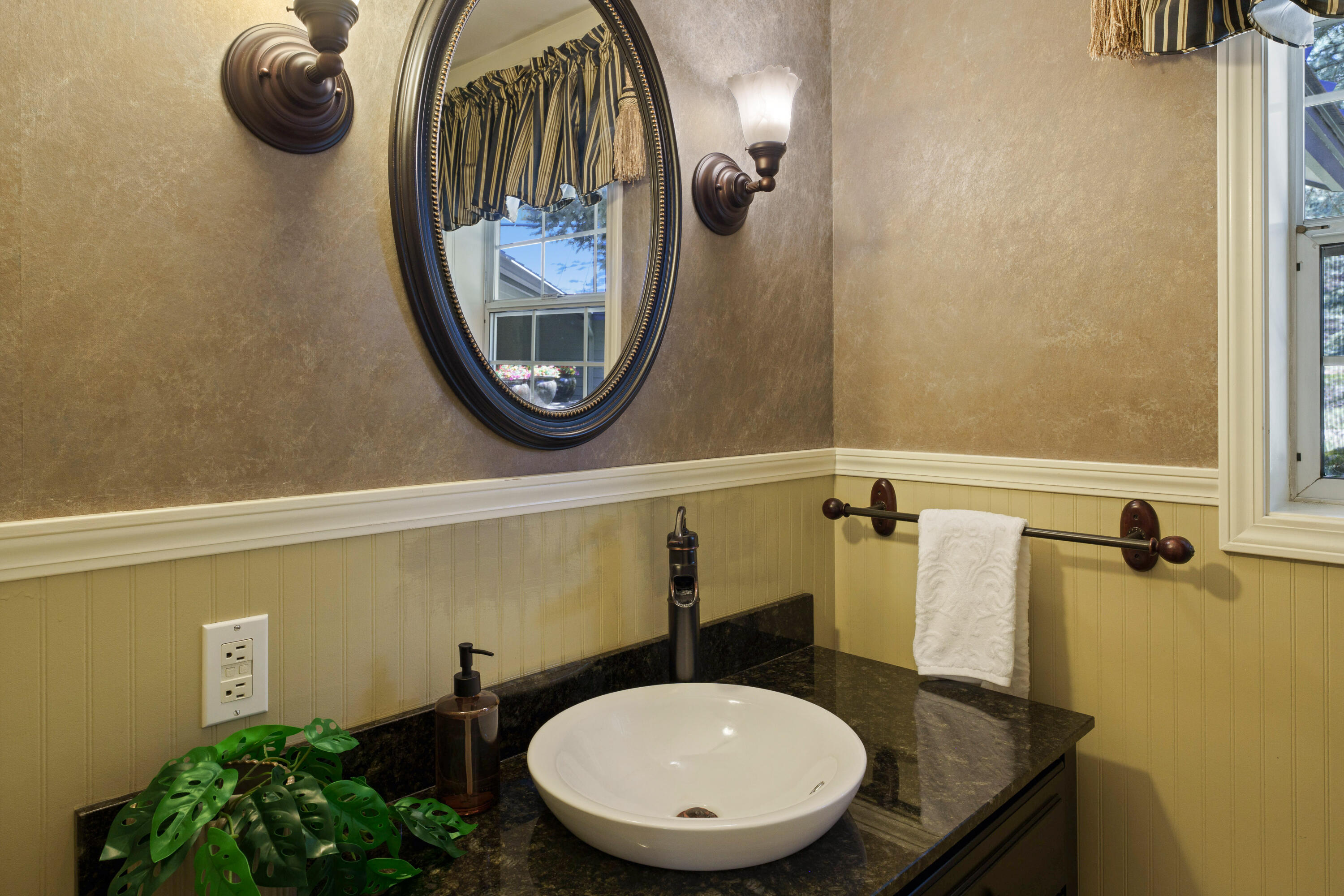 18880 Baker Road Bend, OR 97702 - Photo 44 of 70 a bathroom with a sink and a mirror