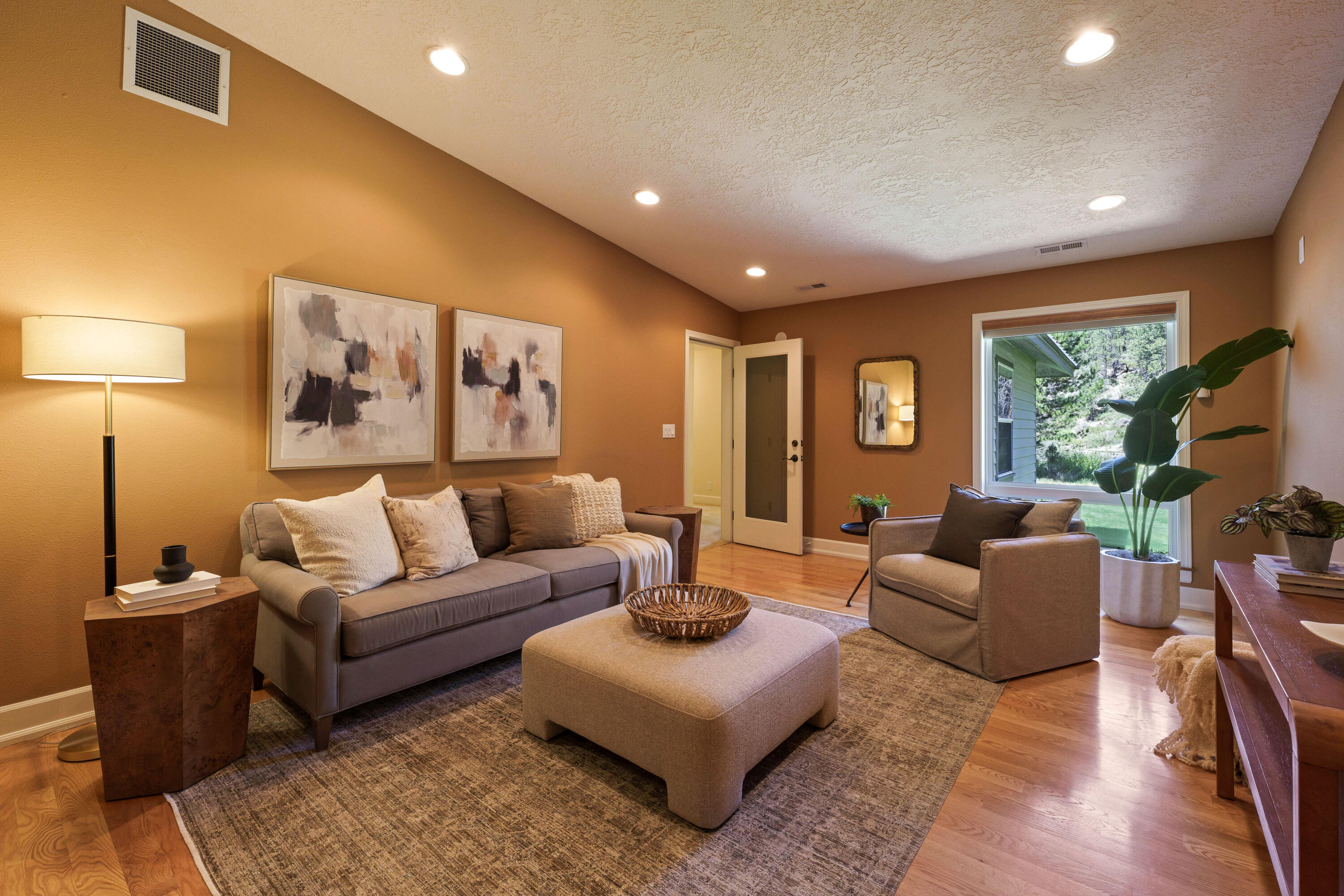 18880 Baker Road Bend, OR 97702 - Photo 50 of 70 a living room with furniture and a flat screen tv