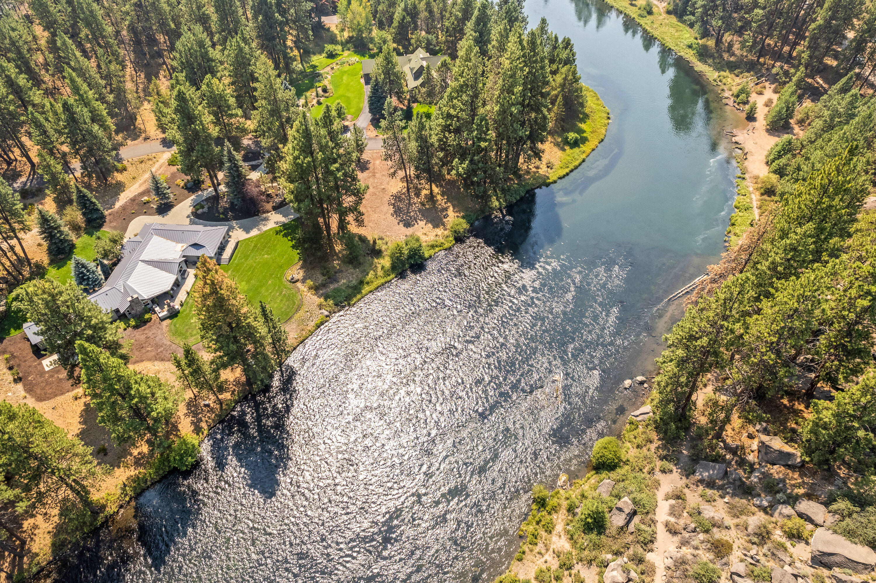 18880 Baker Road Bend, OR 97702 - Photo 5 of 70 a view of a yard with plants