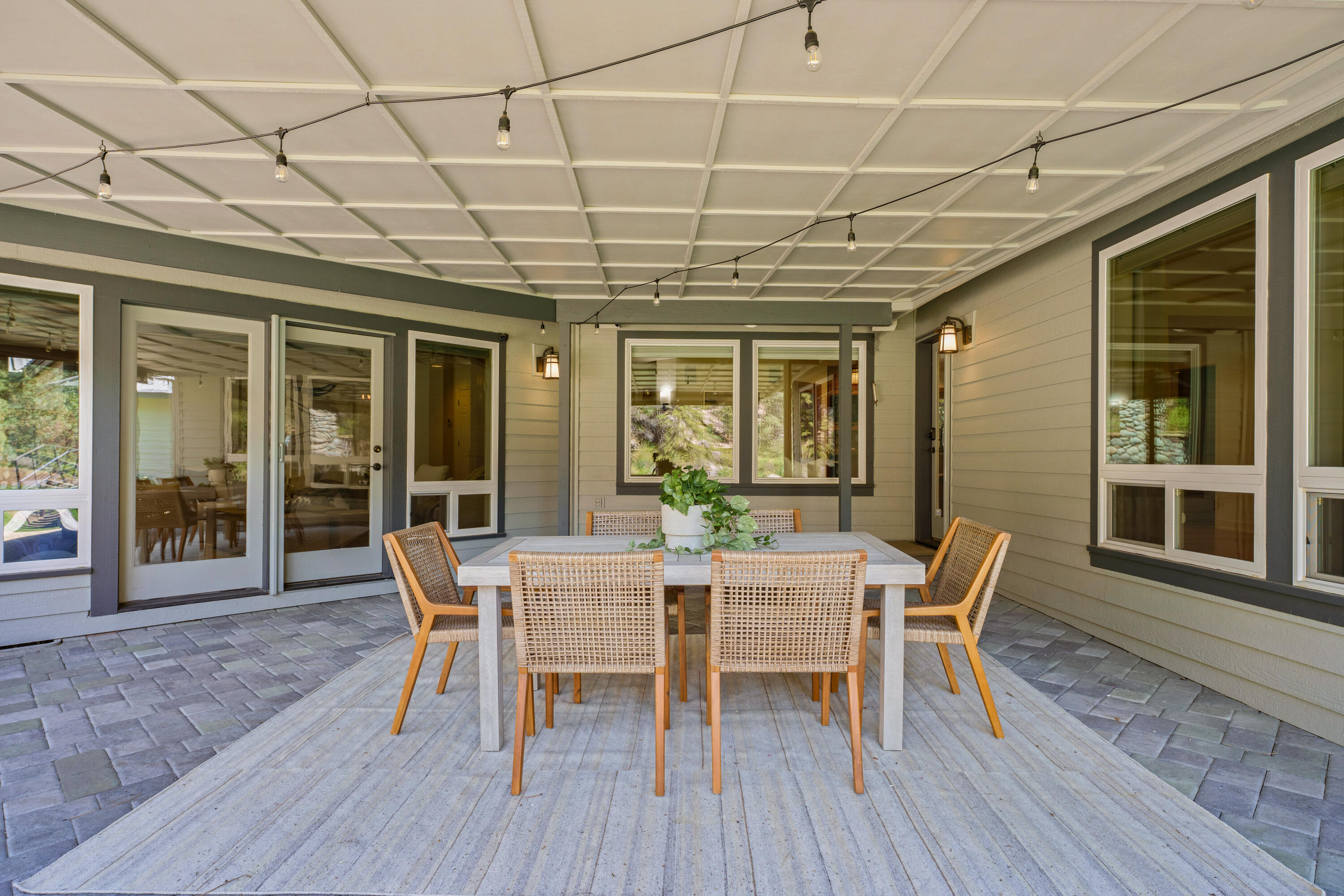 18880 Baker Road Bend, OR 97702 - Photo 54 of 70 a patio with table and chairs