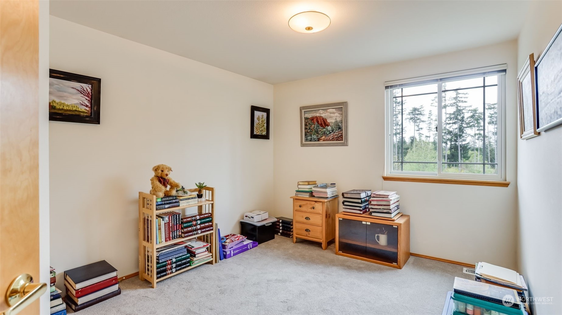 27728 211th Court Southeast Maple Valley, WA 98038 - Photo 13 of 23 a room with furniture and a window