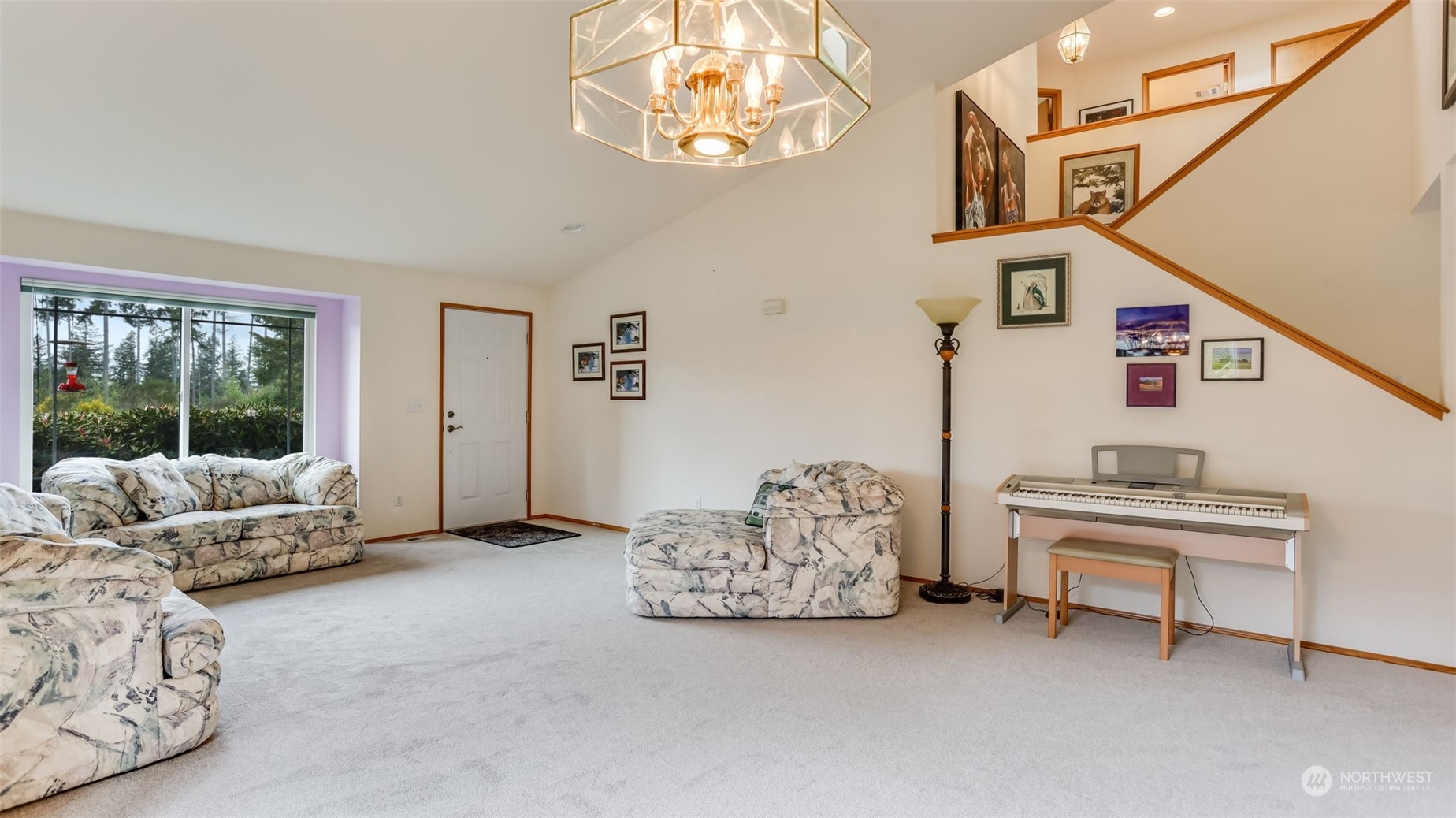 27728 211th Court Southeast Maple Valley, WA 98038 - Photo 2 of 23 a bedroom with furniture and a large window