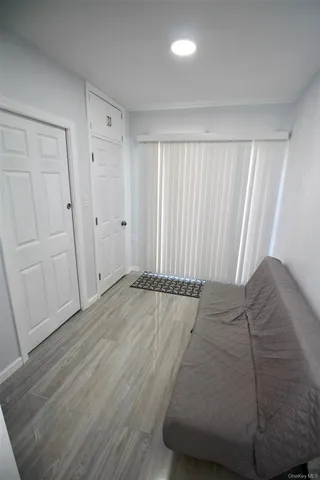 a view of a livingroom with the wooden floor