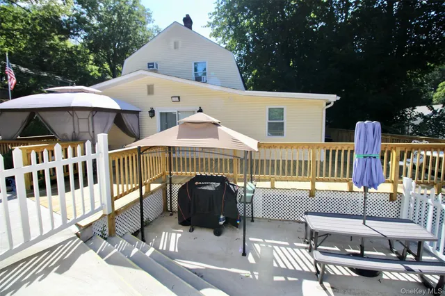 a front view of a house with patio