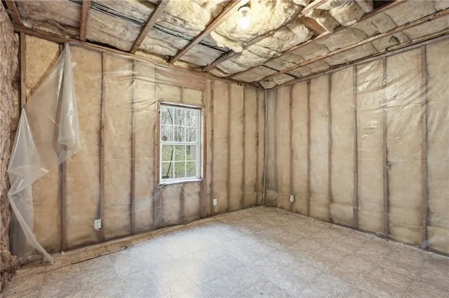 a view of a room with windows