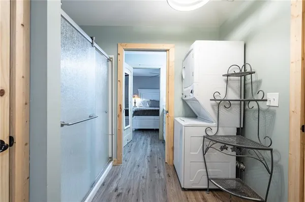 a view of a bathroom from a hallway