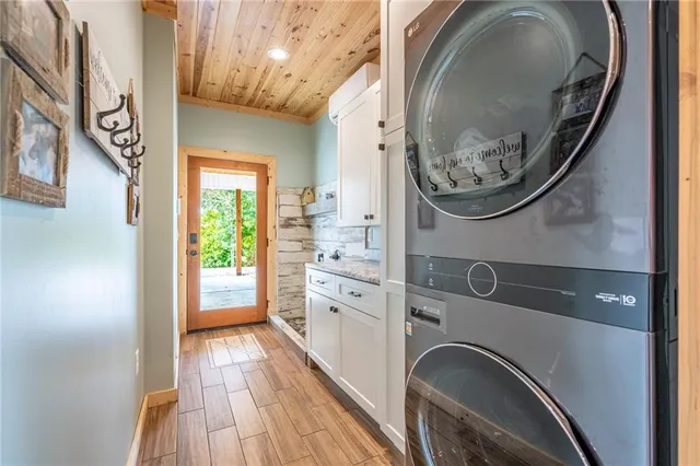 a view of washer and dryer in a bathroom