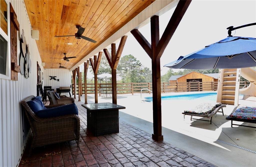 286 County Road 28 Centre, AL 35960 - Photo 27 of 50 a view of living room with furniture and a floor to ceiling window