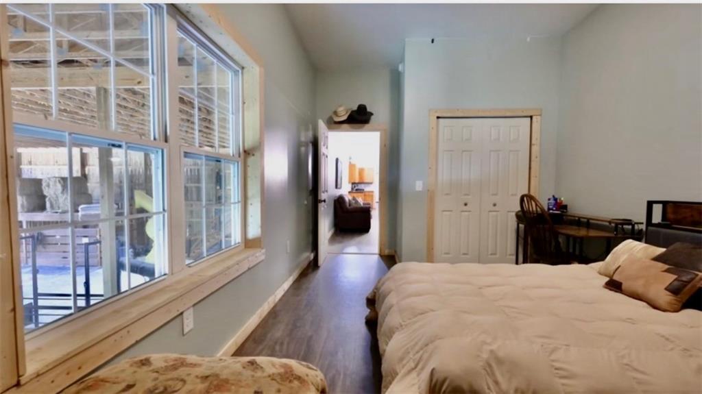 286 County Road 28 Centre, AL 35960 - Photo 42 of 50 a bedroom with a bed and a large window