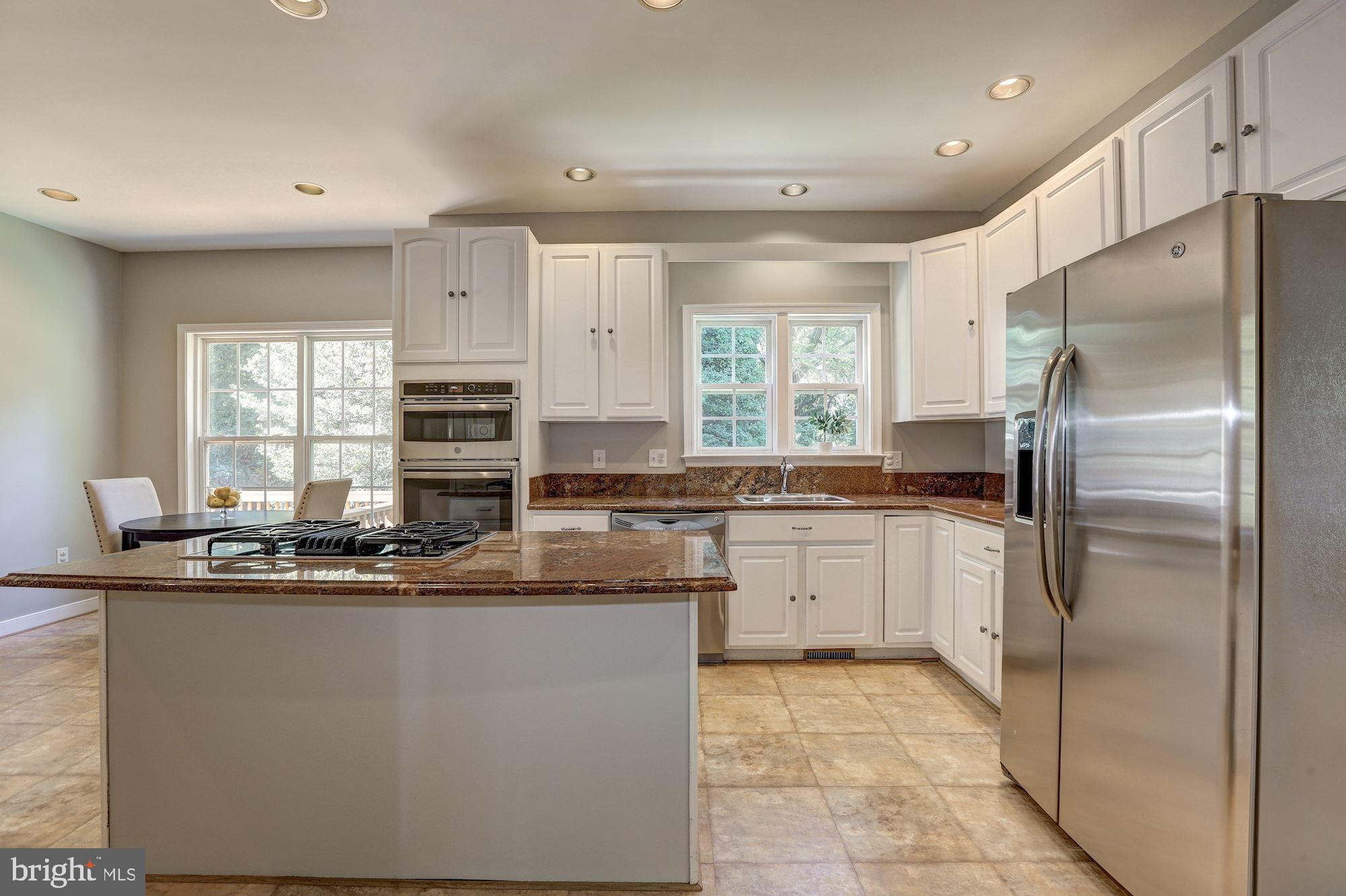 10234 Parkman Road Silver Spring, MD 20903 - Photo 10 of 33 Island storage and seating