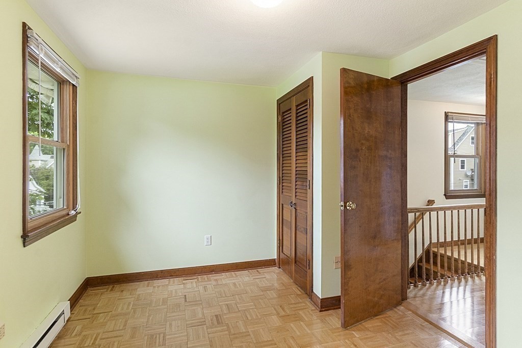 120 Birch Street Boston, MA 02131 - Photo 22 of 42 a view of a hallway with entryway of a house