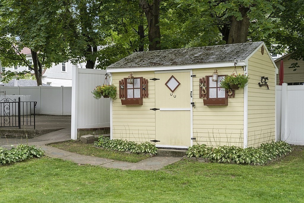 120 Birch Street Boston, MA 02131 - Photo 35 of 42 a view of house with garden