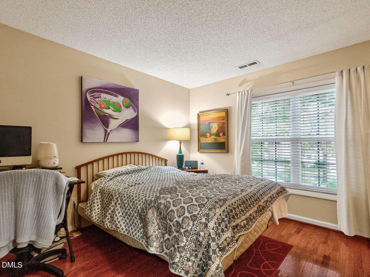 2658 Garden Knoll Lane Raleigh, NC 27614 - Photo 19 of 29 a bedroom with a bed and a window