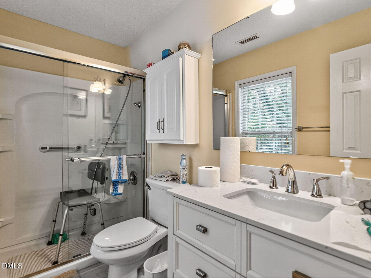 2658 Garden Knoll Lane Raleigh, NC 27614 - Photo 20 of 29 a bathroom with a granite countertop toilet sink and mirror