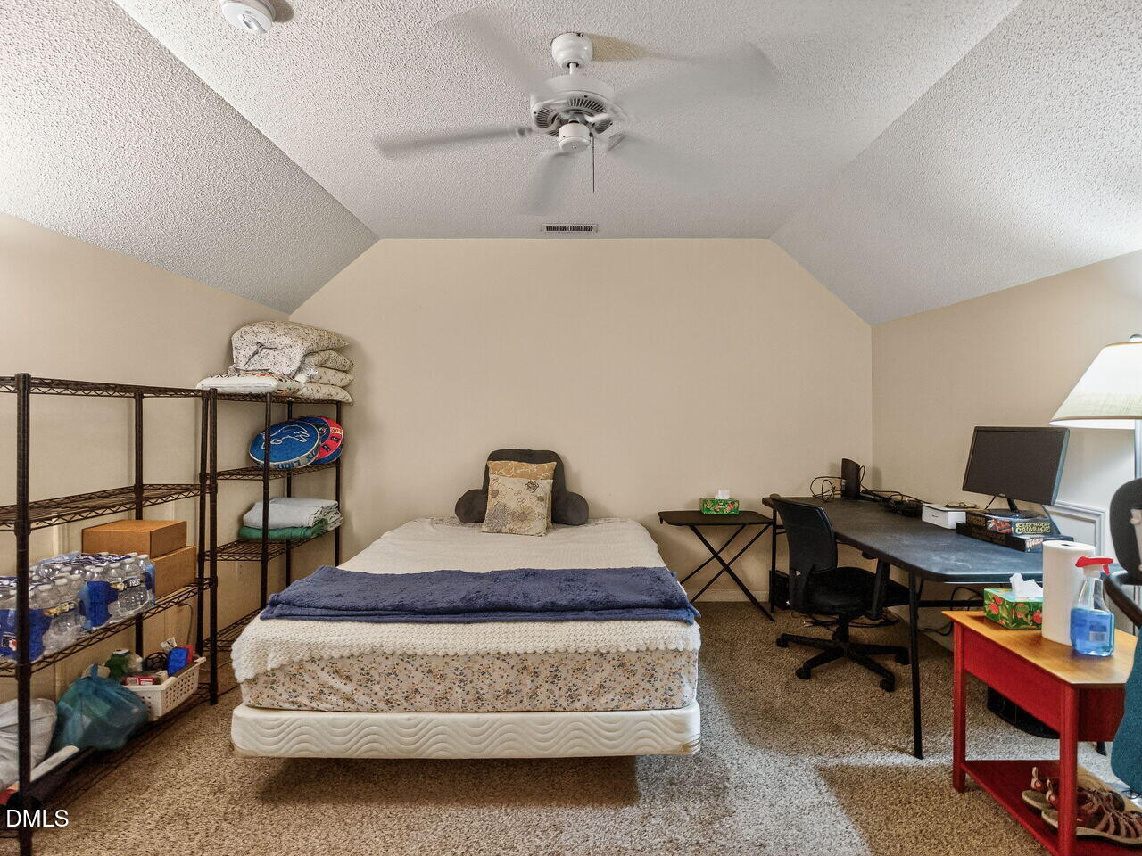 2658 Garden Knoll Lane Raleigh, NC 27614 - Photo 22 of 29 a bedroom with bed and a chandelier