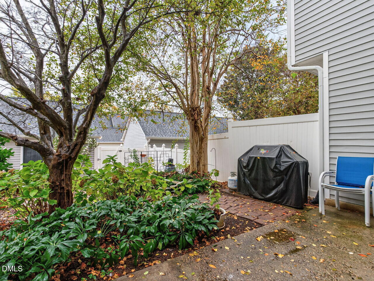 2658 Garden Knoll Lane Raleigh, NC 27614 - Photo 23 of 29 a view of a chairs and table in a backyard