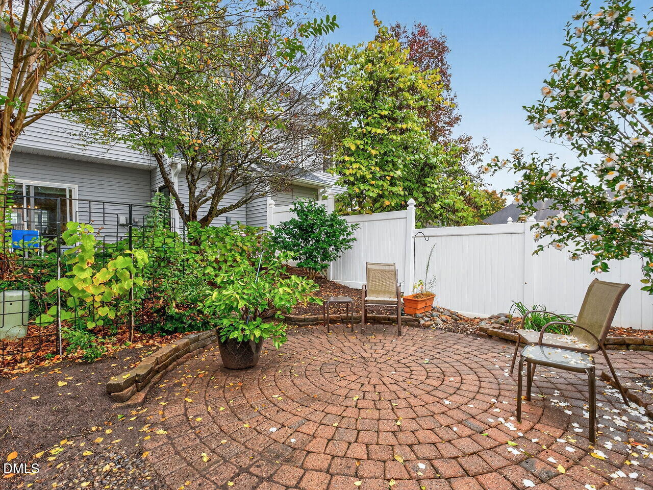 2658 Garden Knoll Lane Raleigh, NC 27614 - Photo 27 of 29 a backyard of a house with table and chairs